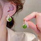 Elegante øredobber med perleimitasjon og rhinestone